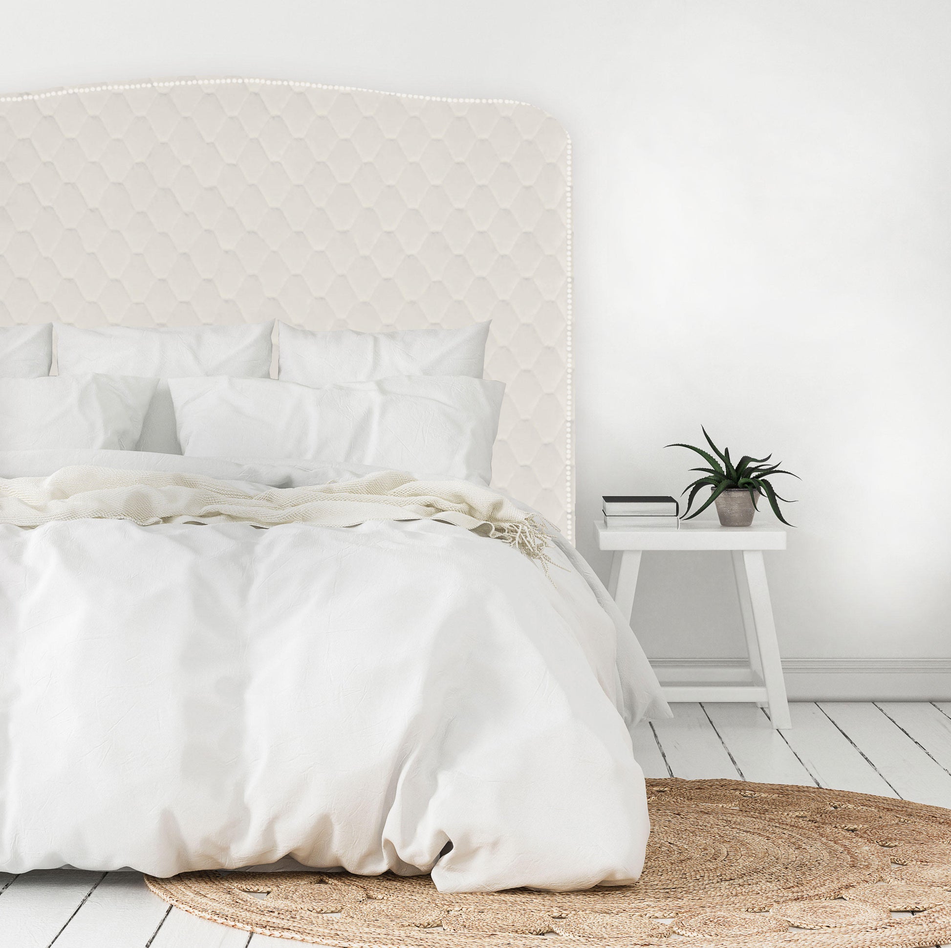 Our classic Cleveland style headboard, upholstered in a diamond stitch-patterned velvet and finished with a row of silver strip studs. NZ made, please allow 6-weeks for production.